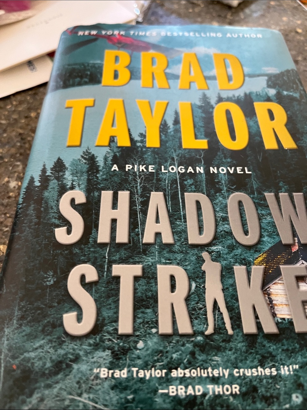 Shadow Strike Hardcover Book - Teal & Yellow Cover